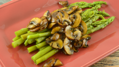Fried asparagus with mushrooms.
